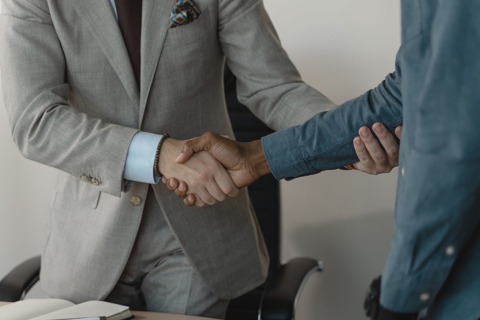 A business handshake in an office