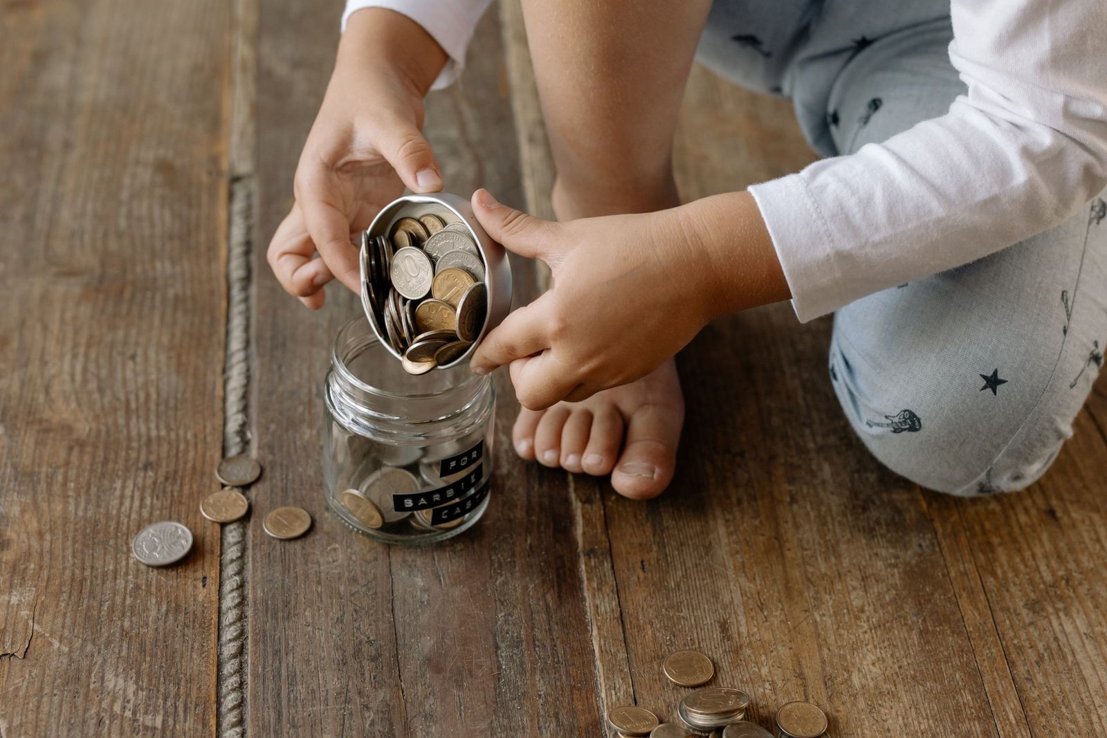 A savings jar with coins