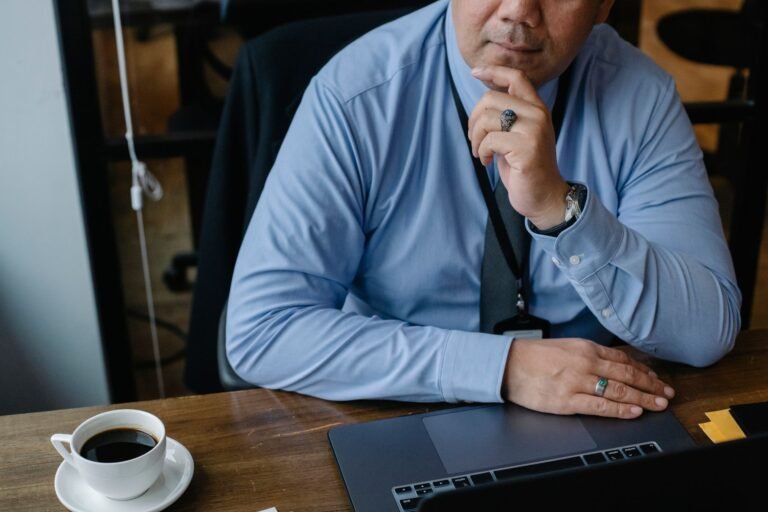 A small business owner working at a desk in an office