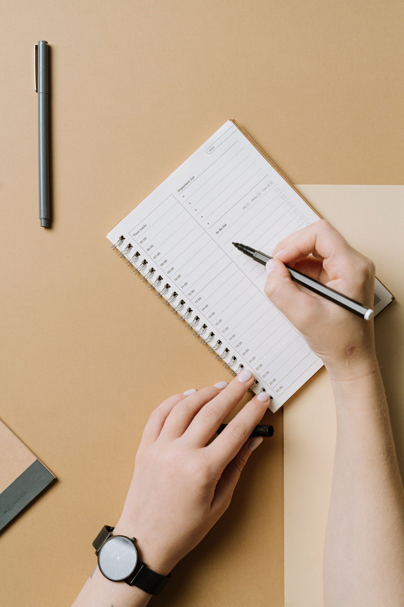 Pen and notebook for financial planning