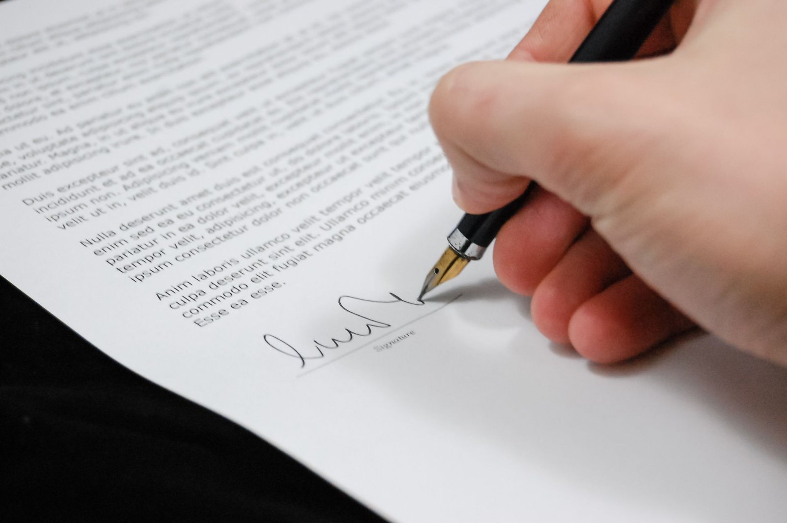 Signing business agreement documents