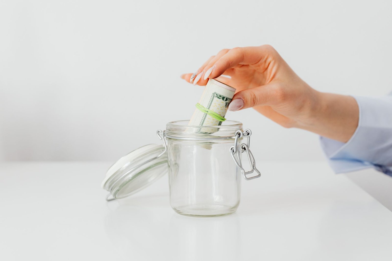 Hand holding savings money