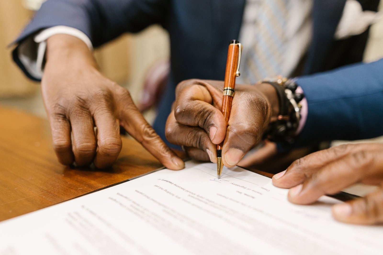 Signing a contract with a pen