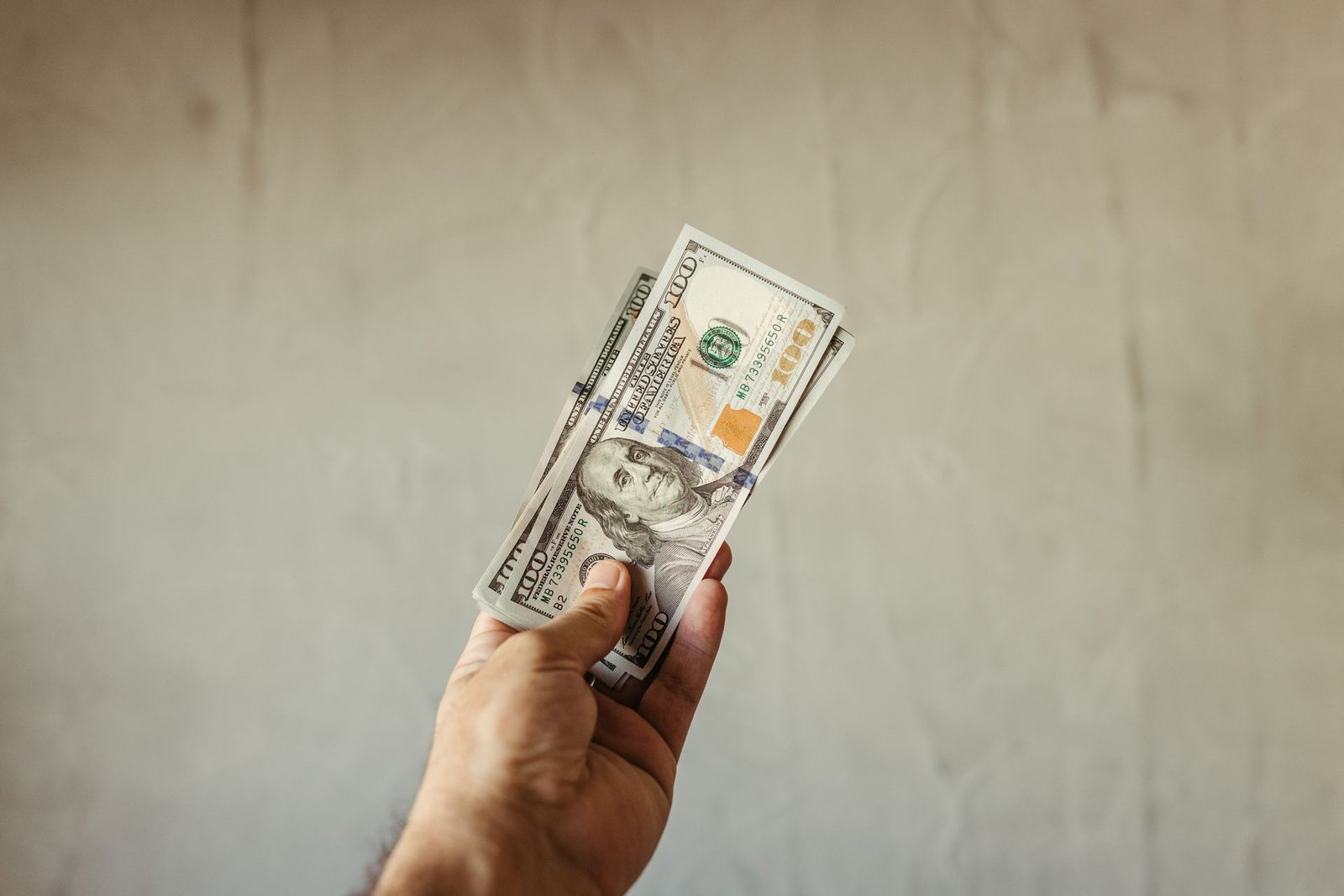 Entrepreneur planning business cash flow at a desk