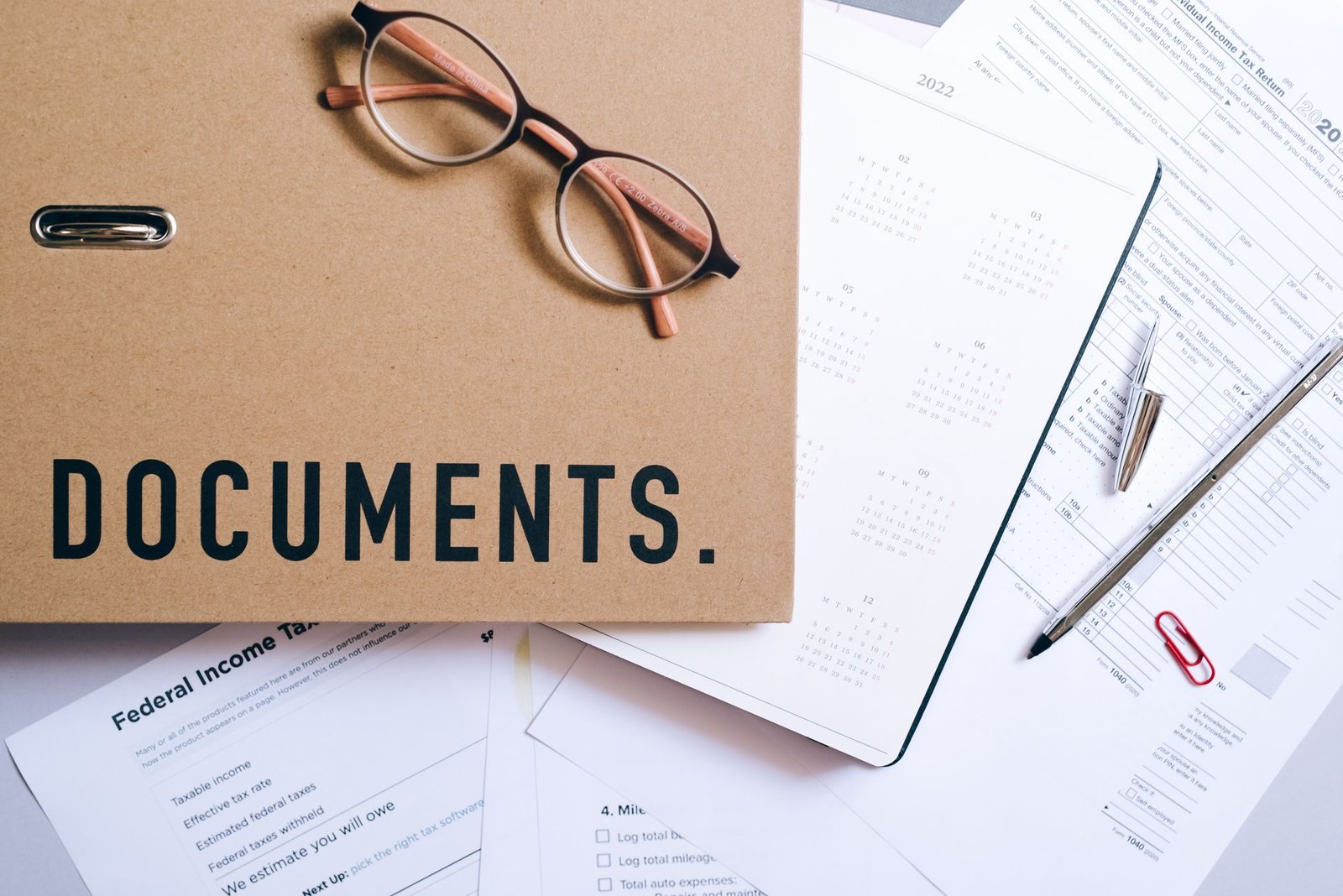 Credit score report document on a desk with financial papers