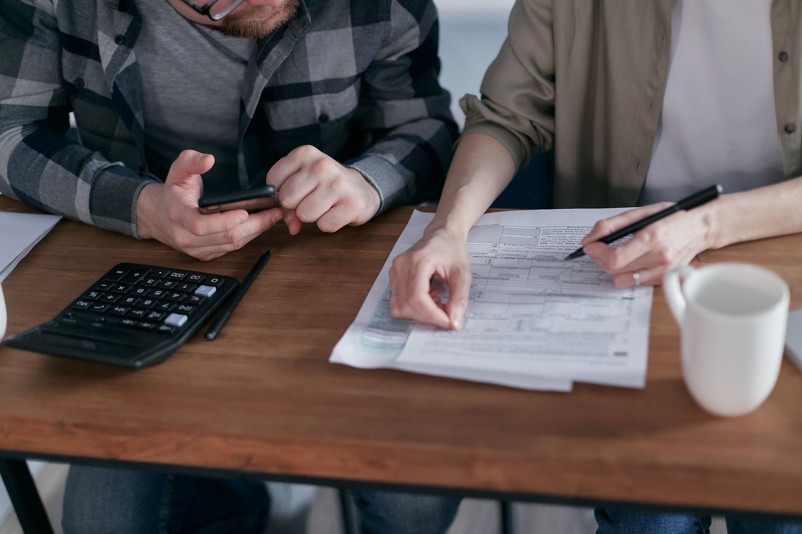 Person reviewing their credit report on a laptop