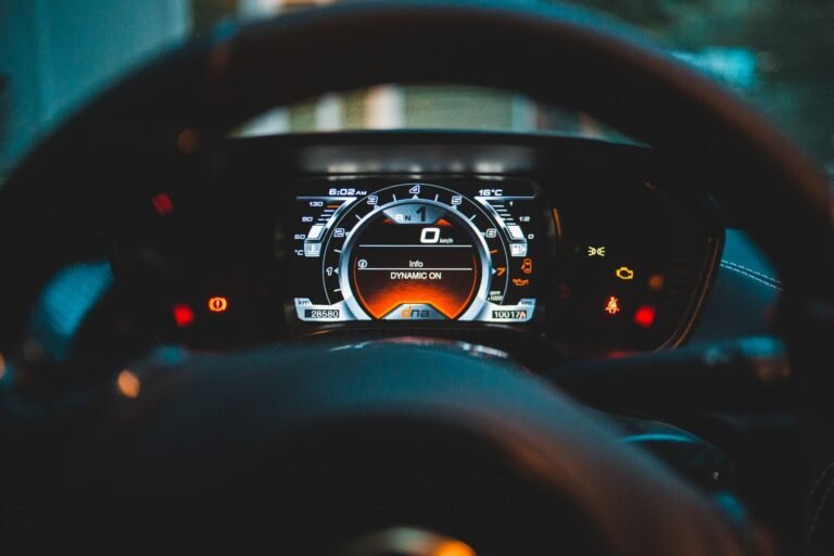 Close-up of a car dashboard with financial paperwork