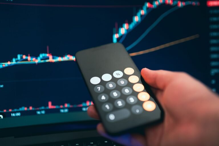 A person checking a finance app on a phone